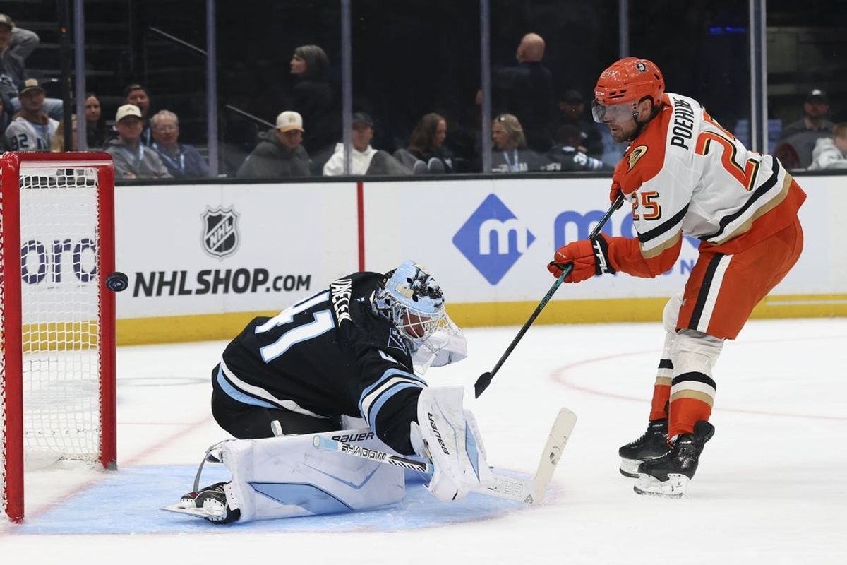 Mar 20, 2026; Salt Lake City, Utah, USA; Anaheim Ducks center Ryan Poehling (25) scores a goal past Utah Mammoth goaltender Vitek Vanecek (41) during the first period at Delta Center. Mandatory Credit: Rob Gray-Imagn Images