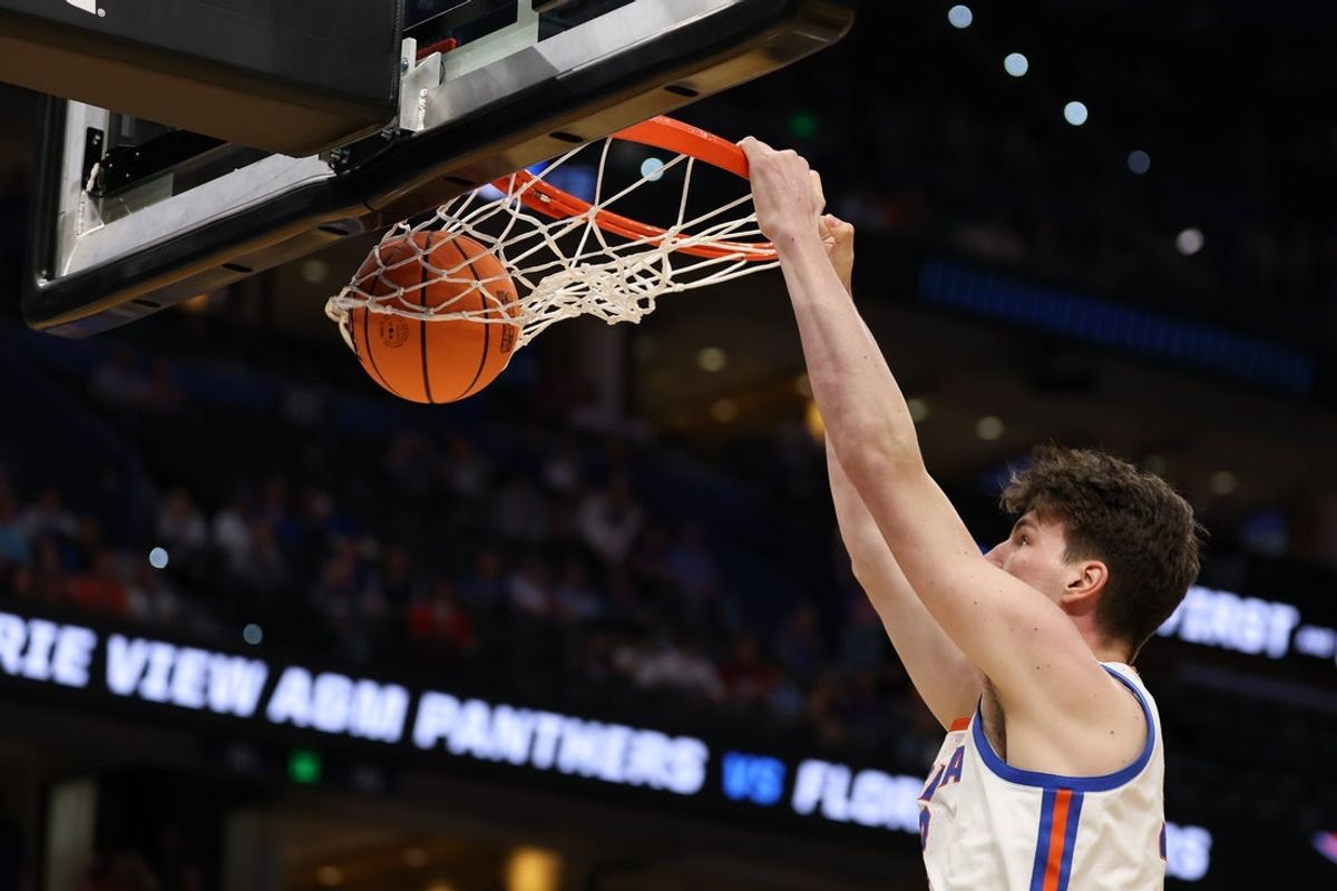 Mar 20, 2026; Tampa, FL, USA; Florida Gators center Olivier Rioux (32) dunks the ball in the second half against the Prairie View A&M Panthers during a first round game of the men's 2026 NCAA Tournament at Benchmark International Arena. Mandatory Credit: Matt Pendleton-Imagn Images