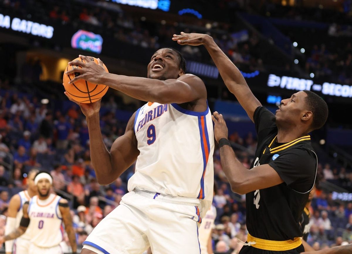 Florida center Rueben Chinyelu (9) shoots during second half of NCAA March Madness opening round at Benchmark international Arena in Tampa, FL on Friday, March 20, 2026. Florida won 114-55.[Alan Youngblood/Gainesville Sun]