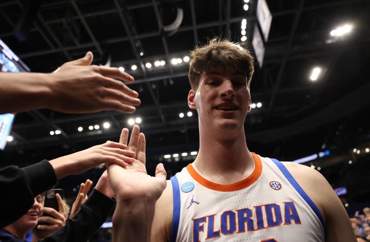 Florida center Olivier Rioux (32) greets fans after Florida’s 114-55 win over Prairie View A&M of the NCAA March Madness opening round at Benchmark international Arena in Tampa, FL on Friday, March 20, 2026. .[Alan Youngblood/Gainesville Sun]
