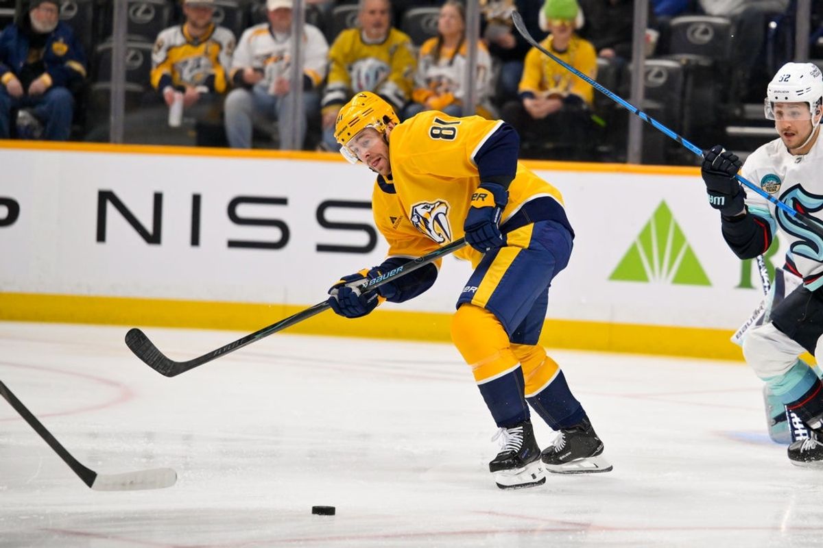 Mar 19, 2026; Nashville, Tennessee, USA;  Nashville Predators center Jonathan Marchessault (81) passes the puck during the first period at Bridgestone Arena. Mandatory Credit: Steve Roberts-Imagn Images