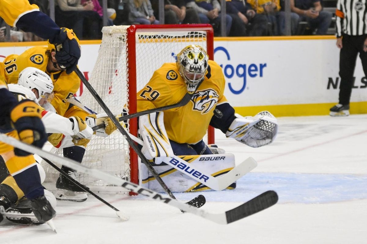Mar 21, 2026; Nashville, Tennessee, USA;  Nashville Predators goaltender Justus Annunen (29) blocks the shot of Vegas Golden Knights left wing Ivan Barbashev (49) during the second period at Bridgestone Arena. Mandatory Credit: Steve Roberts-Imagn Images