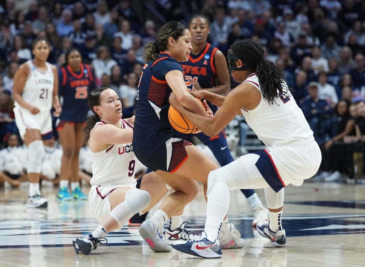 Mar 21, 2026; Storrs, CT, USA; UConn Huskies guard Kk Arnold (2) and guard Kayleigh Heckel (9) defend against UTSA Roadrunners guard Adriana Robles (16) in the first half at Harry A. Gampel Pavilion. Mandatory Credit: David Butler II-Imagn Images