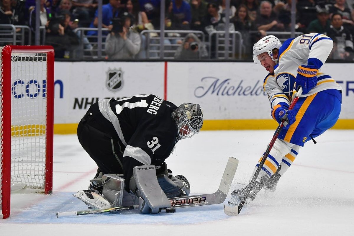 Mar 21, 2026; Los Angeles, California, USA; Los Angeles Kings goaltender Anton Forsberg (31) blocks a shot against Buffalo Sabres right wing Josh Doan (91) during the first period at Crypto.com Arena. Mandatory Credit: Gary A. Vasquez-Imagn Images