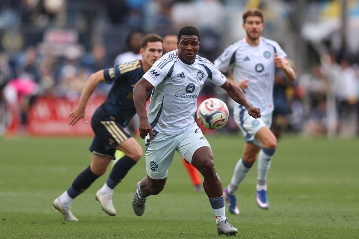 Mar 21, 2026; Chester, Pennsylvania, USA; Chicago Fire defender Mbekezeli Mbokazi (4) chases the ball against the Philadelphia Union during the first half at Subaru Park. Mandatory Credit: Bill Streicher-Imagn Images