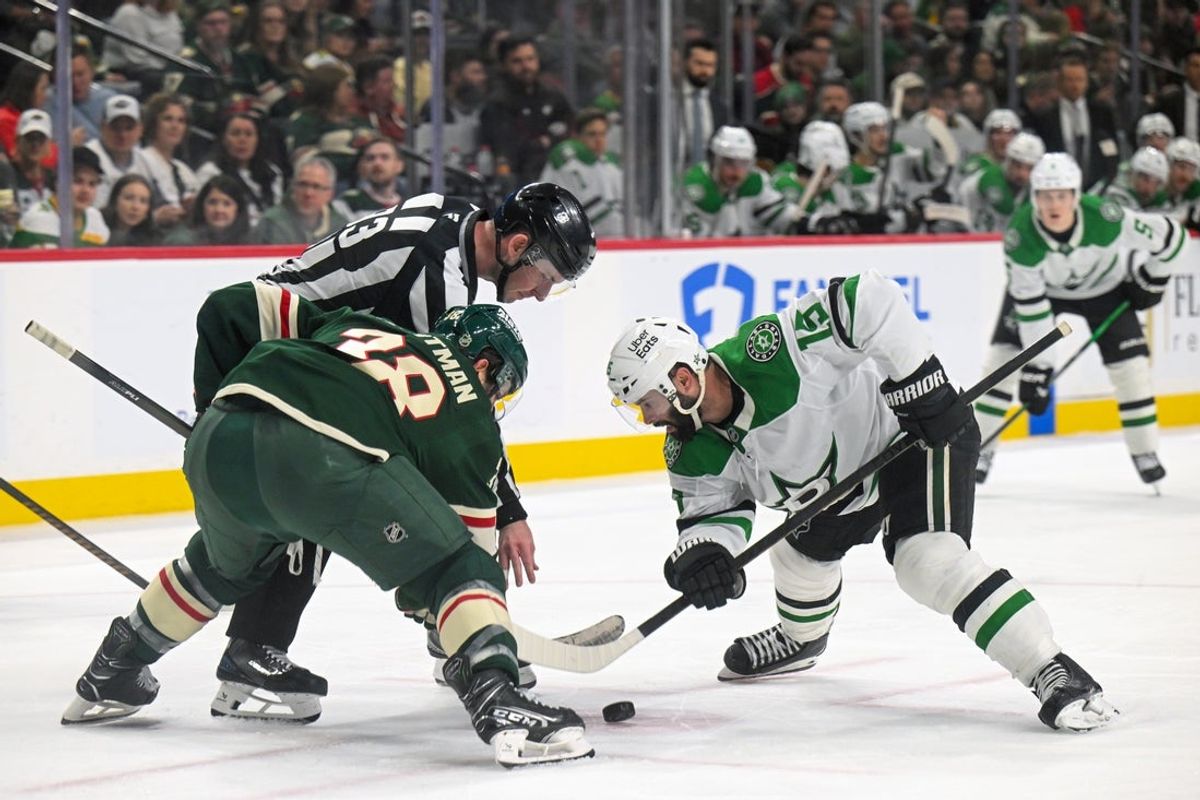 Mar 21, 2026; Saint Paul, Minnesota, USA;  Minnesota Wild forward Ryan Hartman (38) and Dallas Stars forward Colin Blackwell (15) face off during the second period at Grand Casino Arena. Mandatory Credit: Nick Wosika-Imagn Images