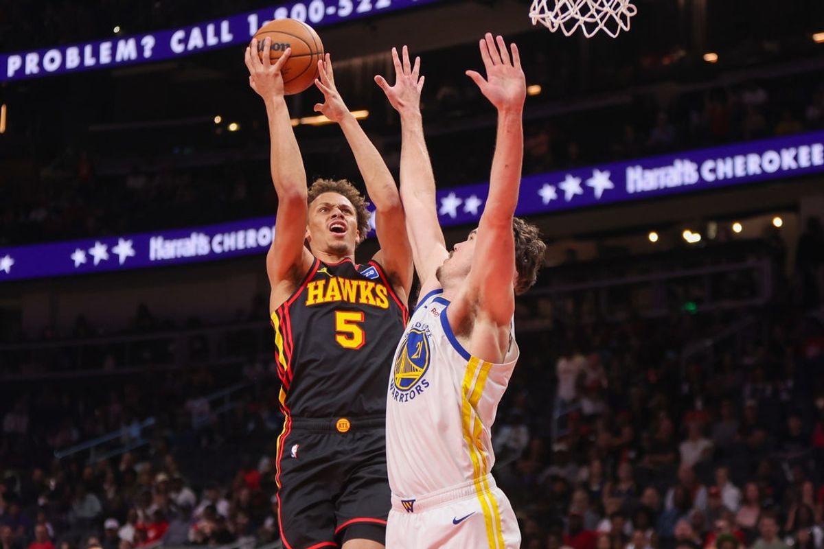 Mar 21, 2026; Atlanta, Georgia, USA; Atlanta Hawks guard Dyson Daniels (5) shoots over Golden State Warriors center Quinten Post (21) in the first quarter at State Farm Arena. Mandatory Credit: Brett Davis-Imagn Images