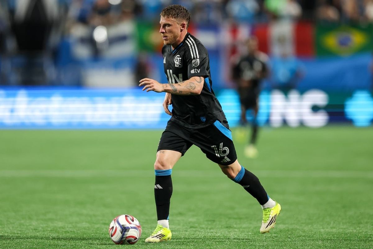 Mar 21, 2026; Charlotte, North Carolina, USA; Charlotte FC midfielder Pep Biel (16) sets up a pass against Red Bulls New York during the first half at Bank of America Stadium. Mandatory Credit: Cory Knowlton-Imagn Images