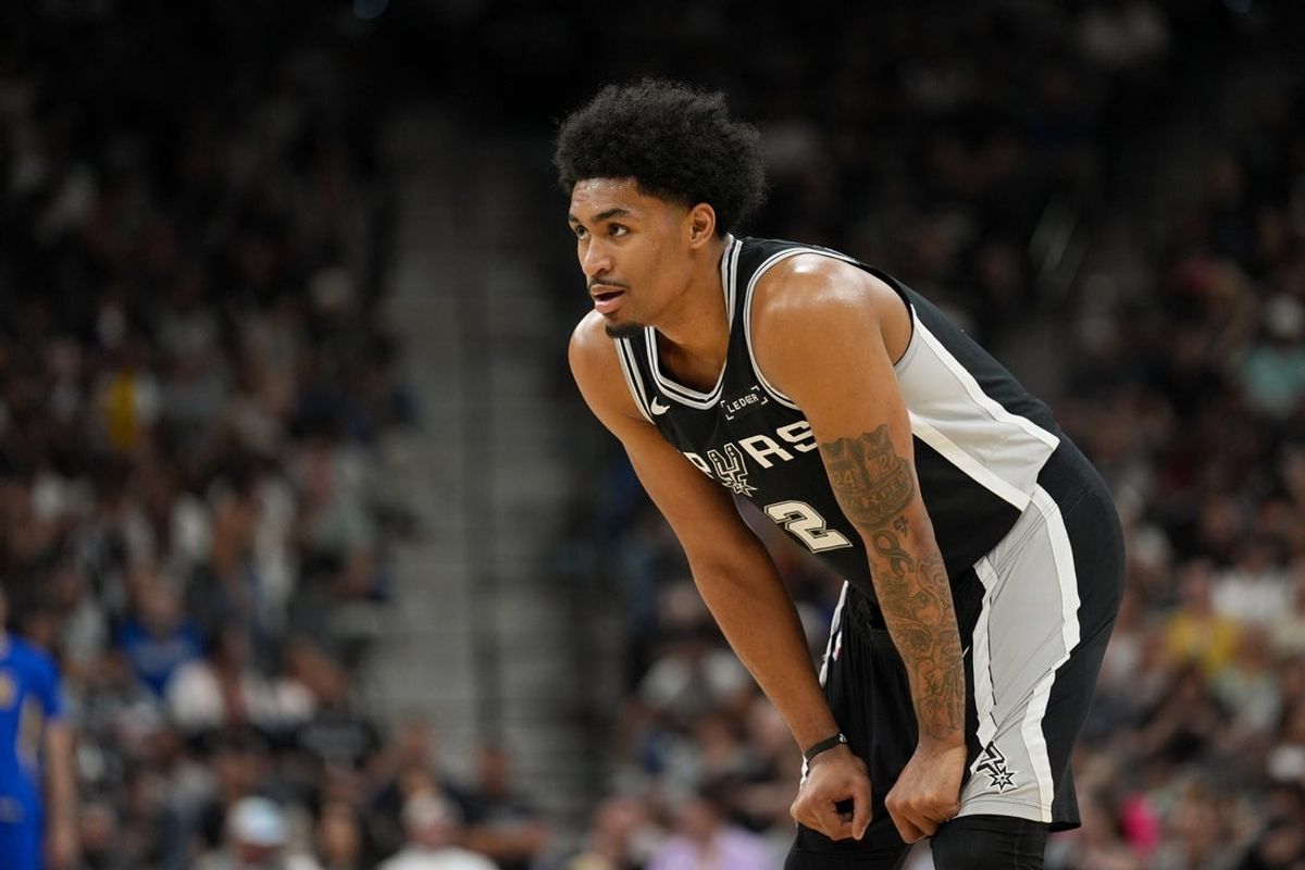 Mar 21, 2026; San Antonio, Texas, USA;  San Antonio Spurs guard Dylan Harper (2) looks over in the first half against the Indiana Pacers at Frost Bank Center. Mandatory Credit: Daniel Dunn-Imagn Images