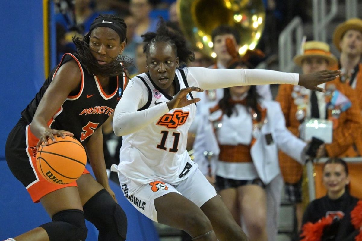 Mar 21, 2026; Los Angeles, CA, USA; Oklahoma State Cowboys forward Achol Akot (11) defends Princeton Tigers guard Fadima Tall (5) in the second half at Pauley Pavilion. Mandatory Credit: Jayne Kamin-Oncea-Imagn Images