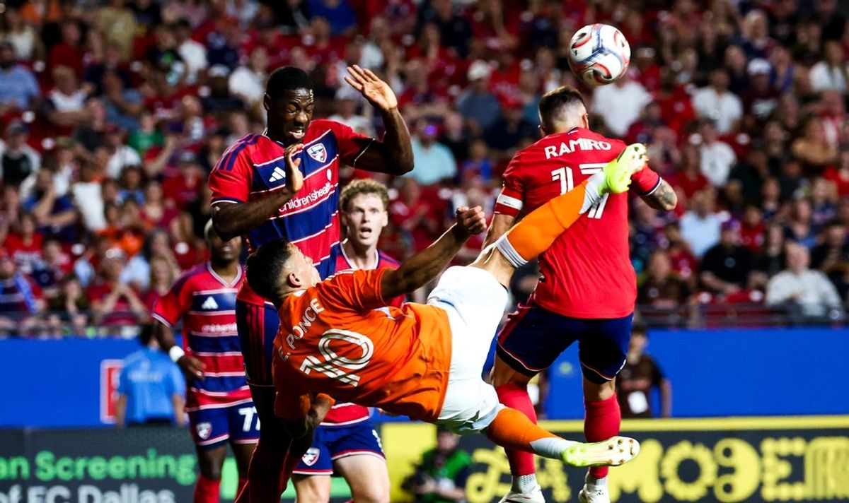 Mar 21, 2026; Frisco, Texas, USA;  Houston Dynamo forward Ezequiel Ponce (10) attempts a bicycle kick as FC Dallas midfielder Ramiro (17) defends during the first half at Toyota Stadium. Mandatory Credit: Kevin Jairaj-Imagn Images