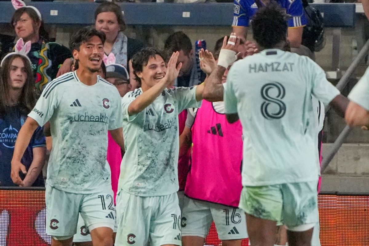 Mar 21, 2026; Kansas City, Kansas, USA; Colorado Rapids midfielder Paxten Aaronson (10) celebrates with team mates after scoring against Sporting Kansas City during the second half of the match at Children's Mercy Park. Mandatory Credit: Denny Medley-Imagn Images