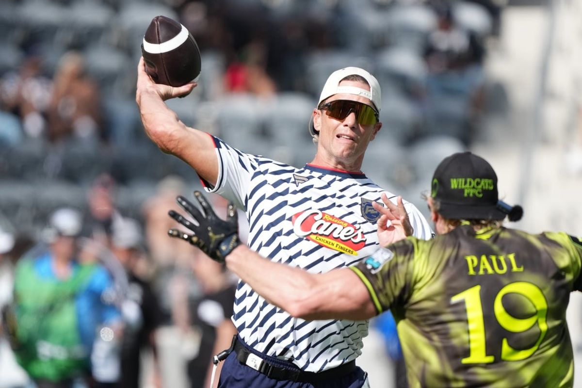Mar 21, 2026; Los Angeles, CA, USA; Founders FFC quarterback Tom Brady (12) throws ball against Logan Paul of Wildcats FFC during the Fanatics Flag Football Classic at BMO stadium. Mandatory Credit: Kirby Lee-Imagn Images