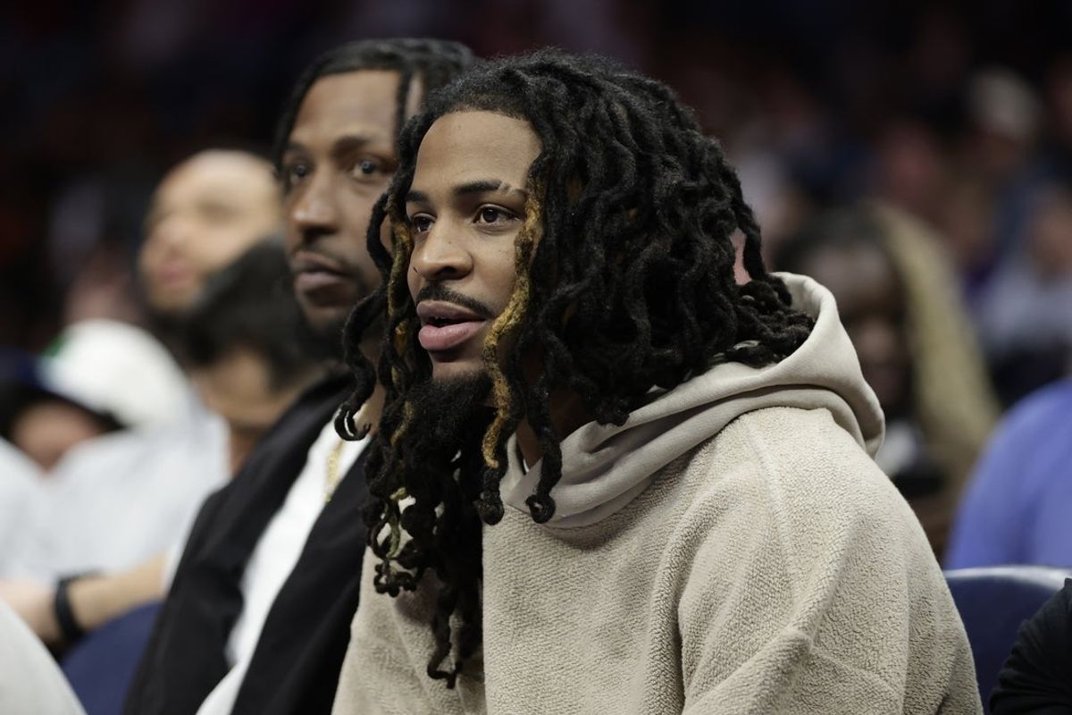 Mar 21, 2026; Charlotte, North Carolina, USA; Memphis Grizzlies guard Ja Morant watches from the bench during the second half against the Charlotte Hornets at Spectrum Center. Mandatory Credit: Brian Westerholt-Imagn Images