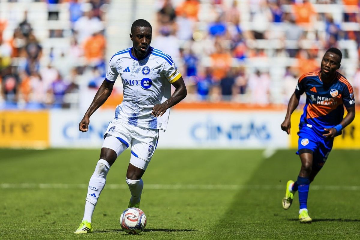Mar 22, 2026; Cincinnati, Ohio, USA; CF Montreal forward Prince Owusu (9) dribbles against FC Cincinnati in the first half at TQL Stadium. Mandatory Credit: Katie Stratman-Imagn Images