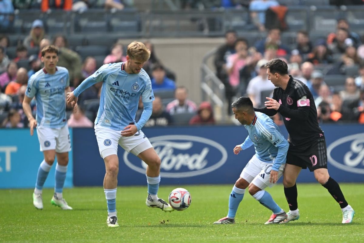Mar 22, 2026; New York, New York, USA; New York City FC midfielder Keaton Parks (55) and New York City FC midfielder Maximiliano Moralez (10) fight for the ball challenged by Inter Miami forward Lionel Messi (10) during the first half at Yankee Stadium. Mandatory Credit: Mark Smith-Imagn Images