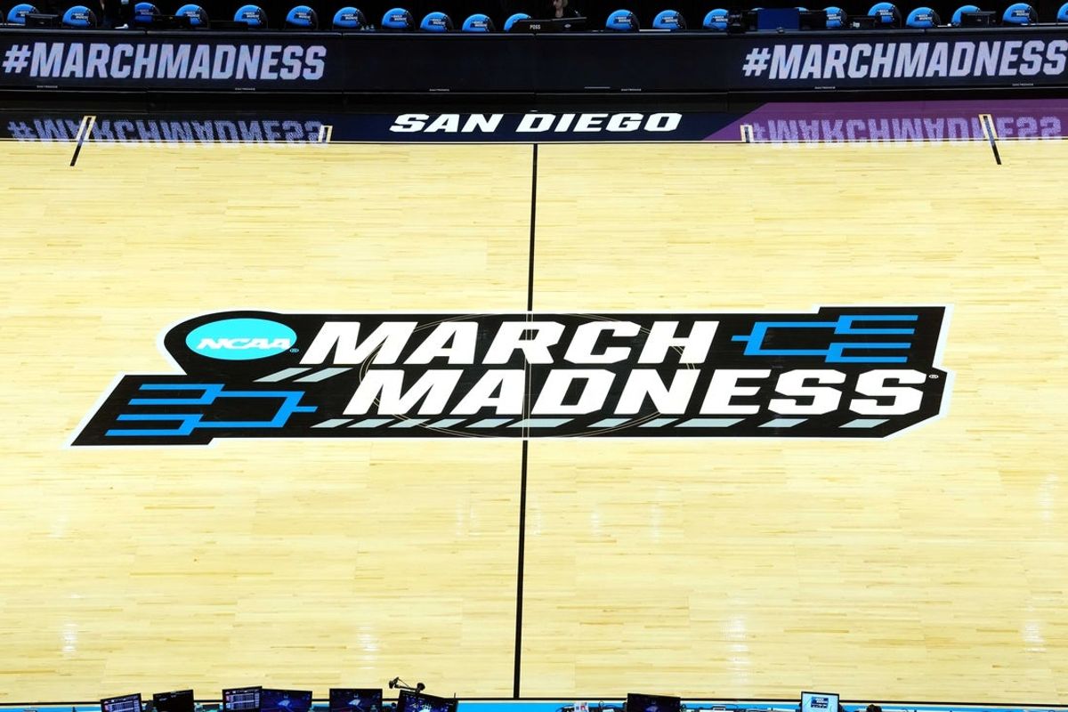 Mar 22, 2026; San Diego, CA, USA; A general overall view of the March Madness logo at midcourt during a second round game of the men's 2026 NCAA Tournament at Viejas Arena. Mandatory Credit: Kirby Lee-Imagn Images