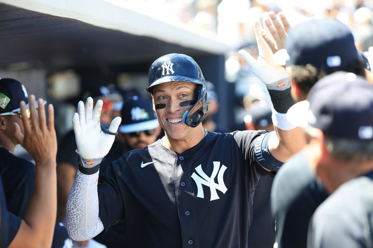 Mar 22, 2026; Tampa, Florida, USA; New York Yankees right fielder Aaron Judge (99) is congratulated after he hit a home run during the fifth inning against the Philadelphia Phillies at George M. Steinbrenner Field. Mandatory Credit: Kim Klement Neitzel-Imagn Images
