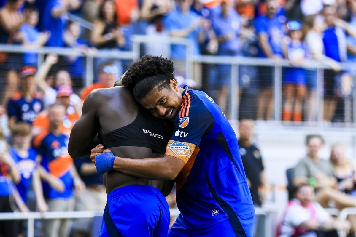 Mar 22, 2026; Cincinnati, Ohio, USA; FC Cincinnati forward Kevin Denkey (9) hugs midfielder Evander (10) after scoring a goal against CF Montreal in the second half at TQL Stadium. Mandatory Credit: Katie Stratman-Imagn Images