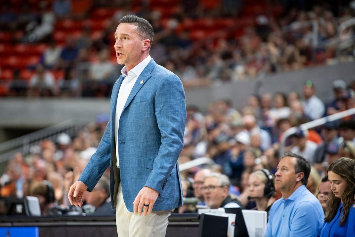 Auburn Tigers head coach Steven Pearl talks with his team as Auburn Tigers take on Seattle Redhawks during the second round of the National Invitation Tournament at Neville Arena in Auburn, Ala. on Sunday, March 22, 2026.