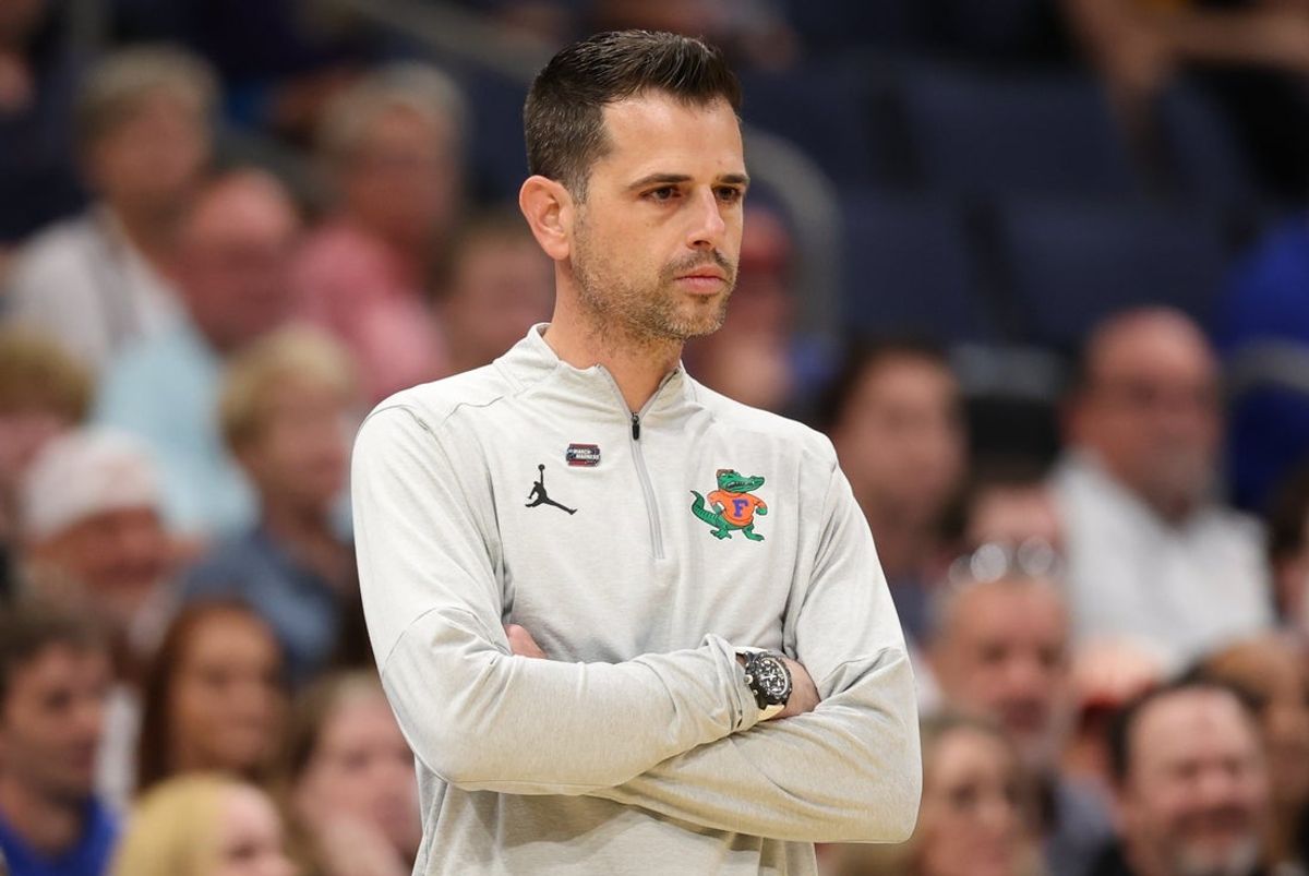 Mar 22, 2026; Tampa, FL, USA; Florida Gators head coach Todd Golden looks on against the Iowa Hawkeyes in the first half during a second round game of the men's 2026 NCAA Tournament at Benchmark International Arena. Mandatory Credit: Matt Pendleton-Imagn Images