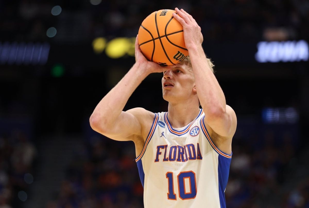 Mar 22, 2026; Tampa, FL, USA; Florida Gators forward Thomas Haugh (10) shoots the ball against the Iowa Hawkeyes in the first half during a second round game of the men's 2026 NCAA Tournament at Benchmark International Arena. Mandatory Credit: Nathan Ray Seebeck-Imagn Images