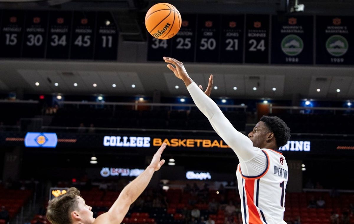 Auburn Tigers guard Kevin Overton (1) takes a jump shot as Auburn Tigers take on Seattle Redhawks during the second round of the National Invitation Tournament at Neville Arena in Auburn, Ala. on Sunday, March 22, 2026. Auburn Tigers lead Seattle Redhawks 42-31 at halftime.