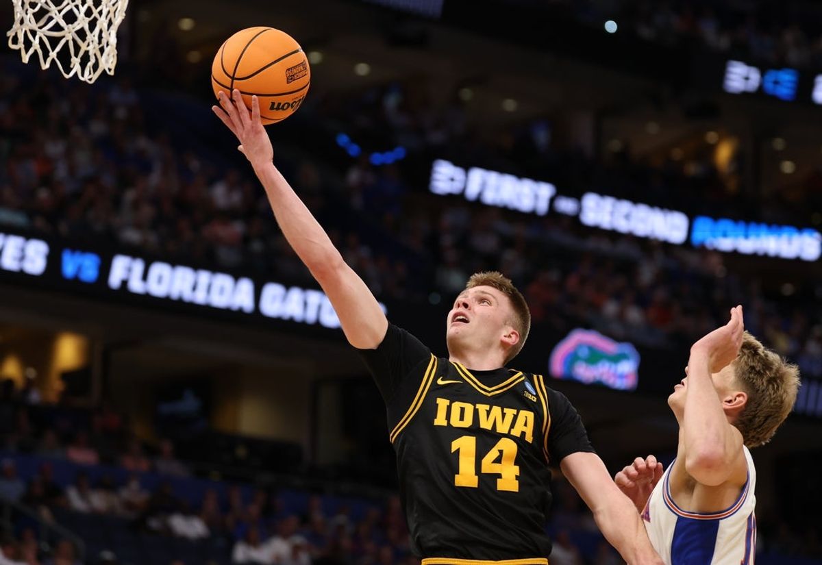 Mar 22, 2026; Tampa, FL, USA; Iowa Hawkeyes guard Bennett Stirtz (14) shoots against the Florida Gators in the first half during a second round game of the men's 2026 NCAA Tournament at Benchmark International Arena. Mandatory Credit: Matt Pendleton-Imagn Images