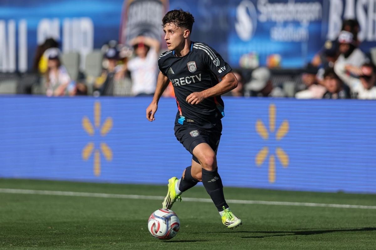 Mar 22, 2026; San Diego, California, USA; San Diego FC defender Luca Bombino (27) moves the ball during the first half against Real Salt Lake at Snapdragon Stadium. Mandatory Credit: Chadd Cady-Imagn Images