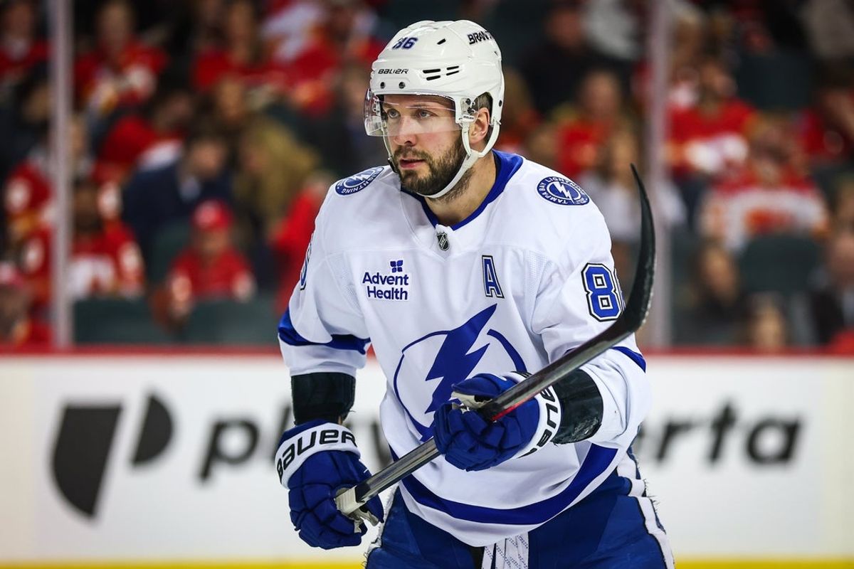 Mar 22, 2026; Calgary, Alberta, CAN; Tampa Bay Lightning right wing Nikita Kucherov (86) during the face off against the Calgary Flames during the first period at Scotiabank Saddledome. Mandatory Credit: Sergei Belski-Imagn Images