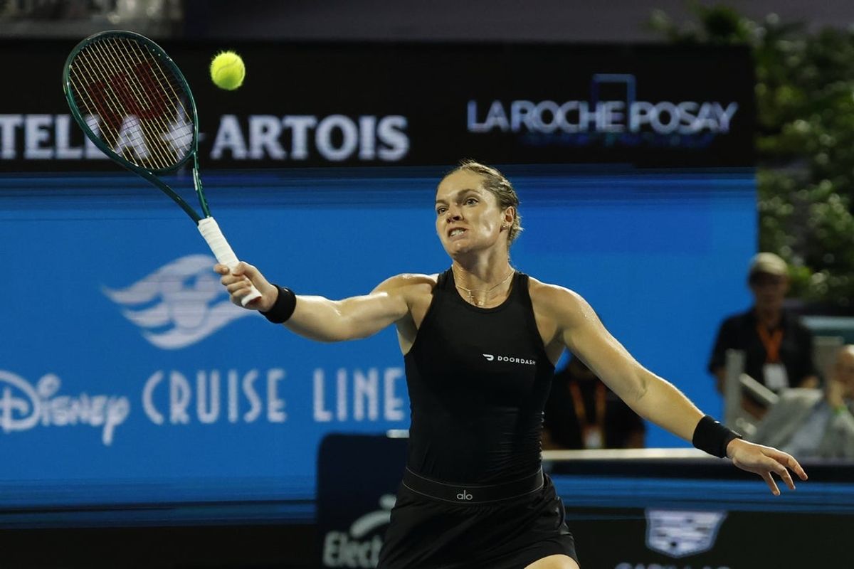 Mar 22, 2026; Miami Gardens, FL, USA; Caty McNally (USA) hits a volley against Aryna Sabalenka (not pictured) on day six of the 2026 Miami Open at Hard Rock Stadium. Mandatory Credit: Geoff Burke-Imagn Images