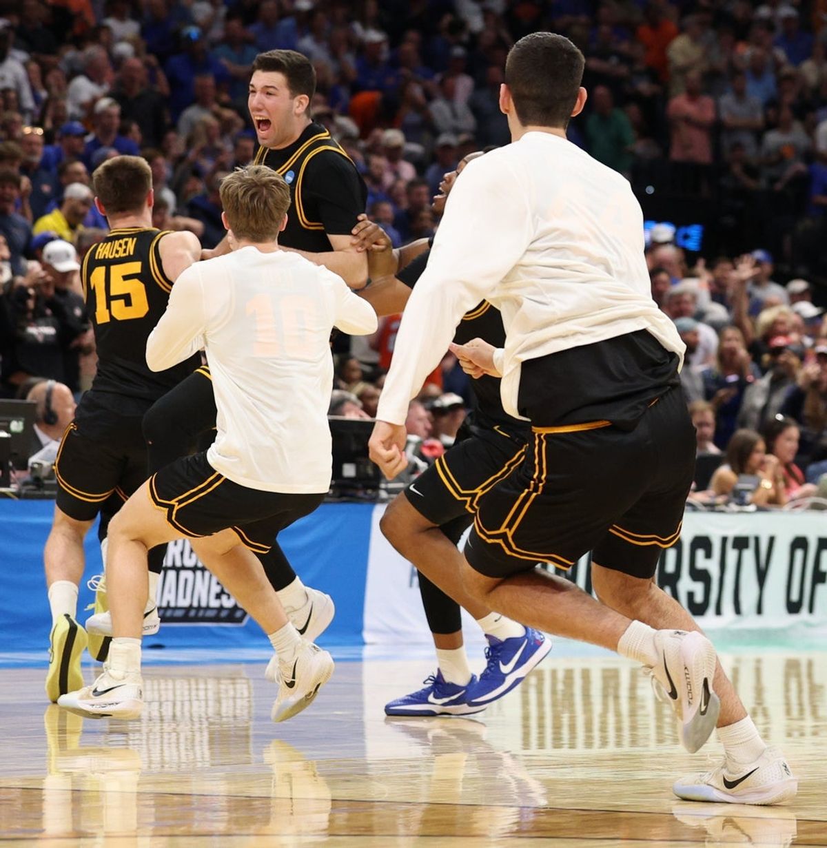 Mar 22, 2026; Tampa, FL, USA; Iowa Hawkeyes forward Alvaro Folgueiras (7) celebrates after defeating the Florida Gators in a second round game of the men's 2026 NCAA Tournament at Benchmark International Arena. Mandatory Credit: Nathan Ray Seebeck-Imagn Images