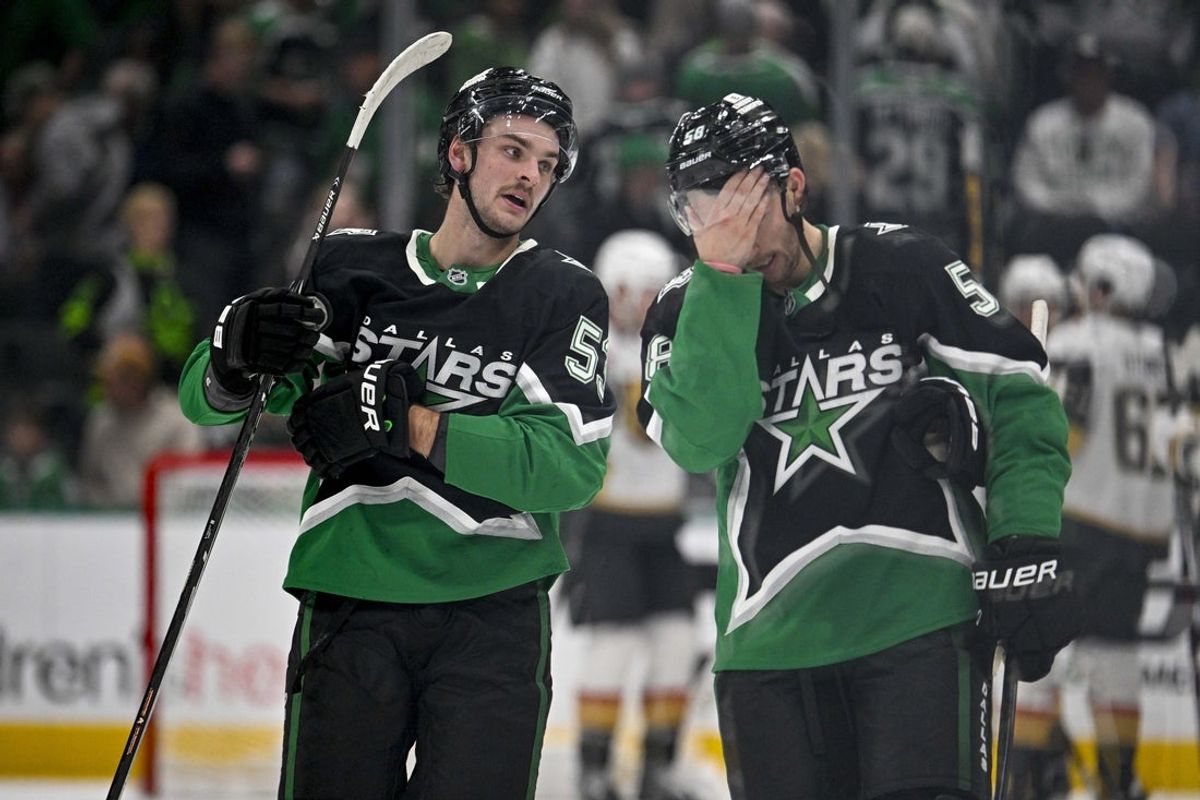 Mar 22, 2026; Dallas, Texas, USA; Dallas Stars center Wyatt Johnston (53) and left wing Michael Bunting (58) skate off the ice after the Vegas Golden Knights victory over the Stars at the American Airlines Center. Mandatory Credit: Jerome Miron-Imagn Images
