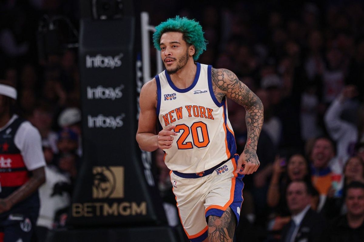 Mar 22, 2026; New York, New York, USA; New York Knicks forward Jeremy Sochan (20) runs up court after a basket during the second half against the Washington Wizards at Madison Square Garden. Mandatory Credit: Vincent Carchietta-Imagn Images