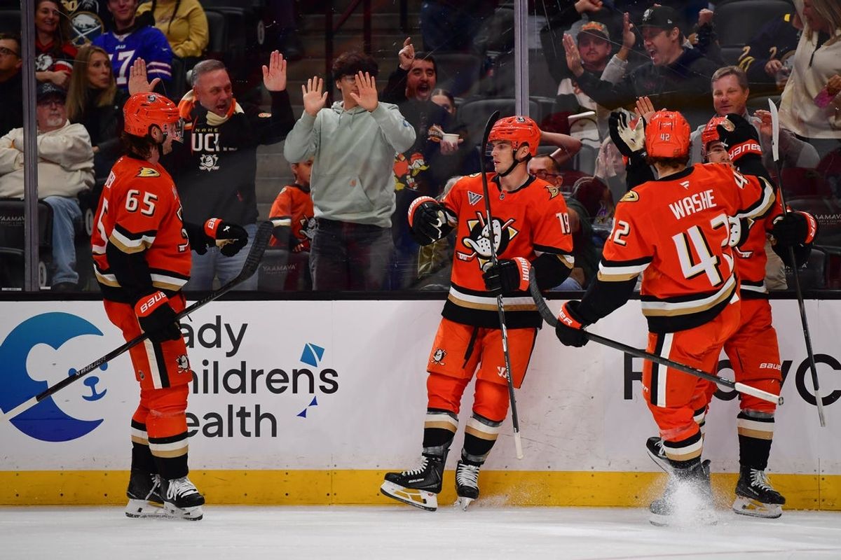 Mar 22, 2026; Anaheim, California, USA; Anaheim Ducks right wing Troy Terry (19) celebrates his goal scored against the Buffalo Sabres with defenseman Jacob Trouba (65) and center Tim Washe (42) during the second period at Honda Center. Mandatory Credit: Gary A. Vasquez-Imagn Images