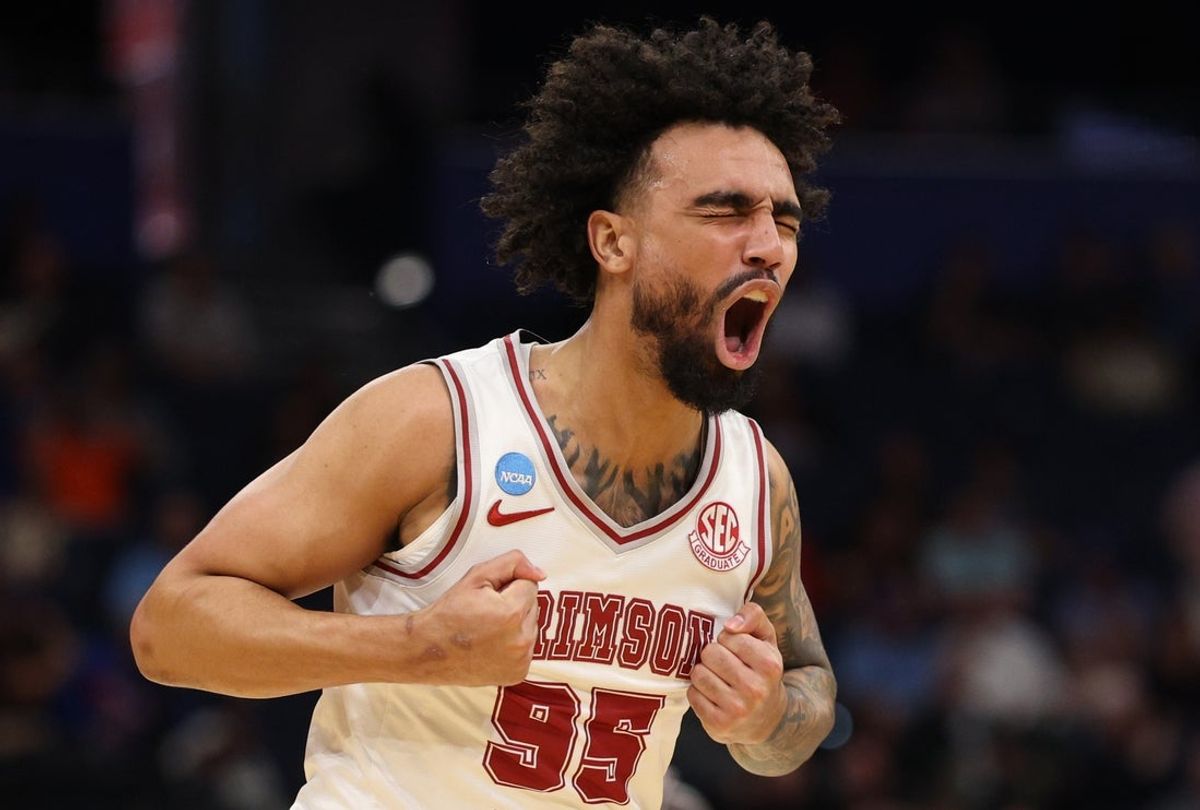 Mar 22, 2026; Tampa, FL, USA; Alabama Crimson Tide guard Houston Mallette (95) celebrates after a play against the Texas Tech Red Raiders in the first half during a second round game of the men's 2026 NCAA Tournament at Benchmark International Arena. Mandatory Credit: Nathan Ray Seebeck-Imagn Images