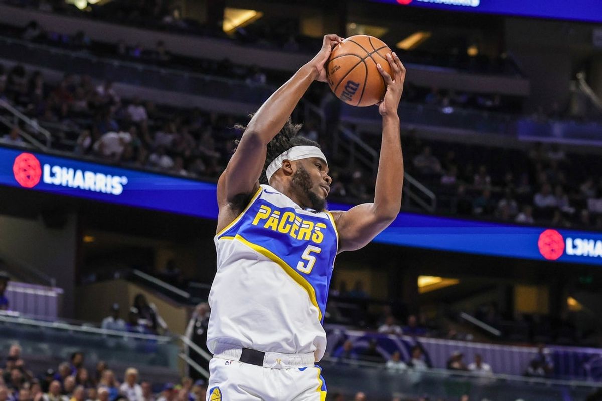 Mar 23, 2026; Orlando, Florida, USA; Indiana Pacers forward Jarace Walker (5) grabs the rebound during the first quarter against the Orlando Magic at Kia Center. Mandatory Credit: Mike Watters-Imagn Images