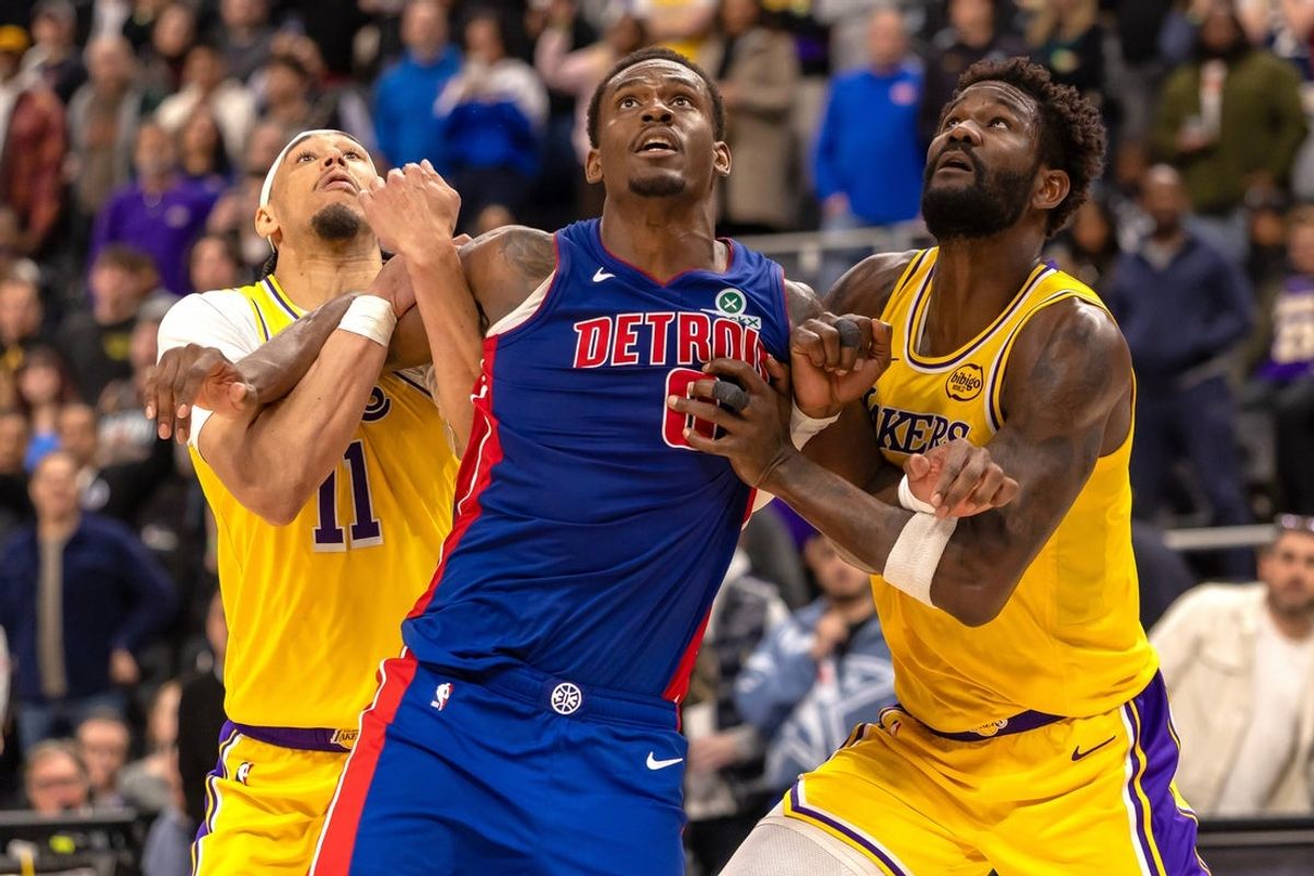Mar 23, 2026; Detroit, Michigan, USA; Detroit Pistons Jalen Duren (0) battles for position between Los Angeles Lakers Jaxson Hayes (11) and Deandre Ayton (5) during the second half at Little Caesars Arena. Mandatory Credit: David Reginek-Imagn Images