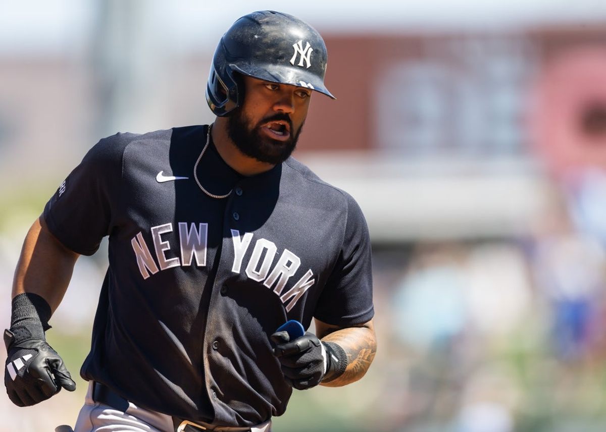 Mar 24, 2026; Mesa, Arizona, USA; New York Yankees outfielder Jasson Dominguez rounds the bases after hitting a home run against the Chicago Cubs during spring training at Sloan Park. Mandatory Credit: Mark J. Rebilas-Imagn Images
