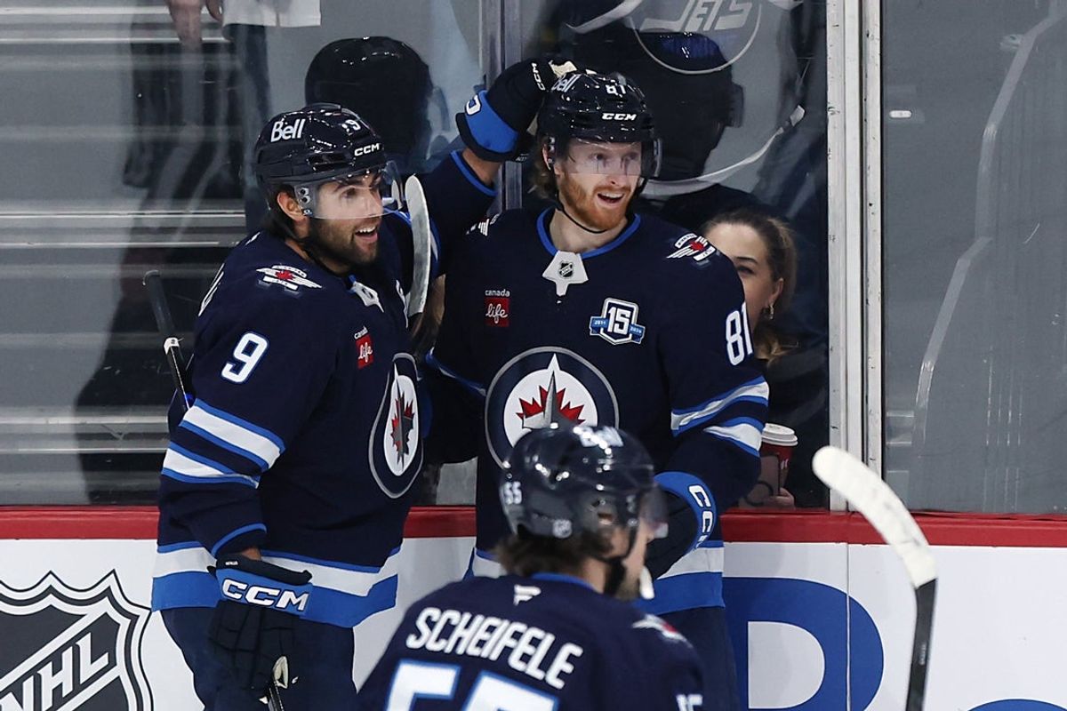Mar 24, 2026; Winnipeg, Manitoba, CAN; Winnipeg Jets left wing Kyle Connor (81) celebrates a goal against the Vegas Golden Knights with Winnipeg Jets left wing Alex Iafallo (9) in the first period at Canada Life Centre. Mandatory Credit: James Carey Lauder-Imagn Images
