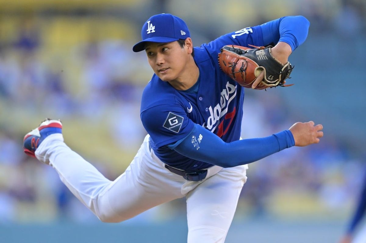 Mar 24, 2026; Los Angeles, California, USA;  Los Angeles Dodgers two-way player Shohei Ohtani (17) delivers to the plate in the second inning against the Los Angeles Angels at Dodger Stadium. Mandatory Credit: Jayne Kamin-Oncea-Imagn Images