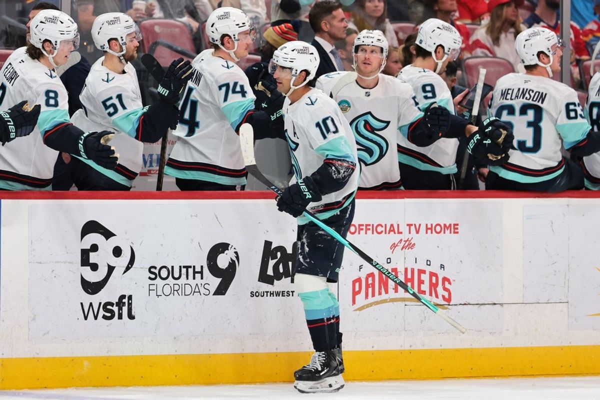 Mar 24, 2026; Sunrise, Florida, USA; Seattle Kraken center Matty Beniers (10) celebrates after scoring against the Florida Panthers during the third period at Amerant Bank Arena. Mandatory Credit: Sam Navarro-Imagn Images