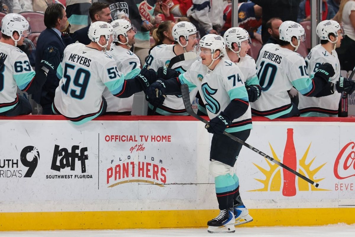 Mar 24, 2026; Sunrise, Florida, USA; Seattle Kraken center Bobby McMann (74) celebrates with teammates after scoring against the Florida Panthers during the third period at Amerant Bank Arena. Mandatory Credit: Sam Navarro-Imagn Images