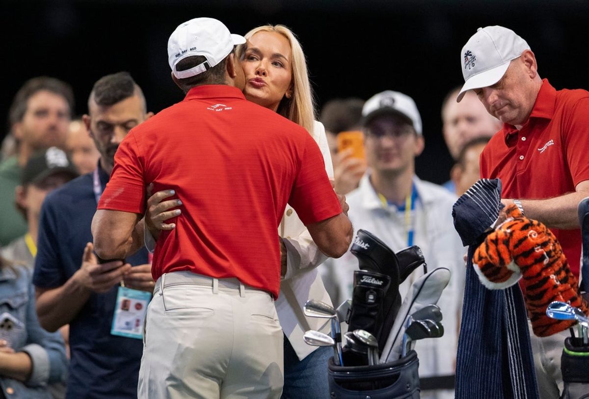 Tiger Woods of Jupiter Links GC gets a hug and kiss from Vanessa Trump before match against Los Angeles Golf Club during the TGL finals at SoFi Center on March 24, 2026, in Palm Beach Gardens, Florida.