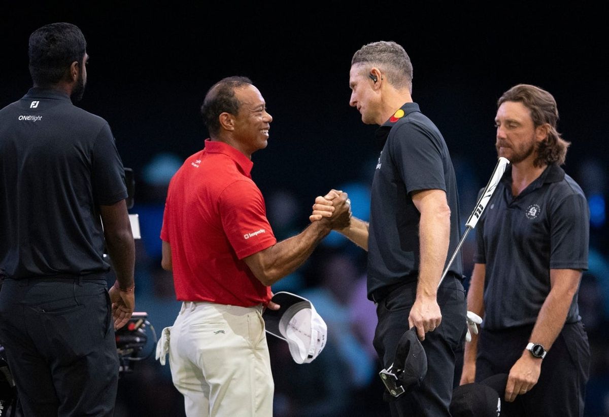 (File Photo) Tiger Woods of Jupiter Links GC congratulates Justin Rose of Los Angeles Golf Club who won the TGL finals at SoFi Center on March 24, 2026, in Palm Beach Gardens, Florida.