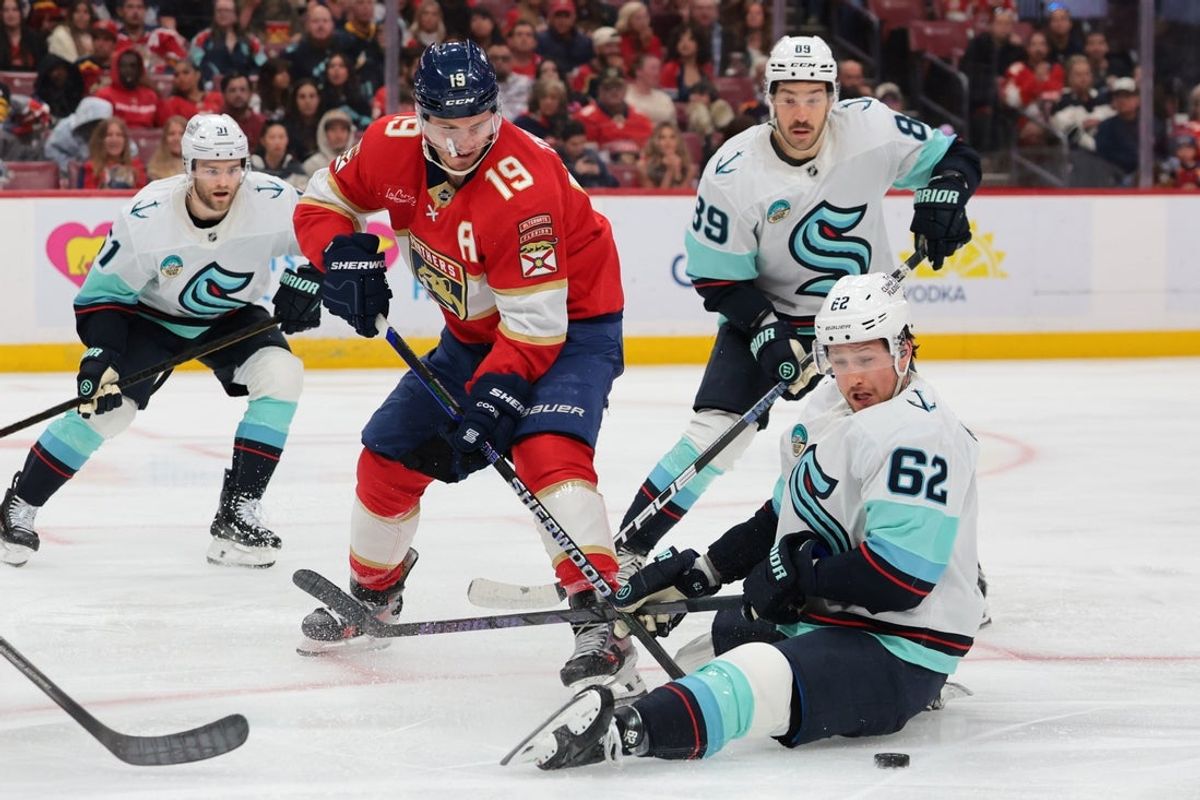 Mar 24, 2026; Sunrise, Florida, USA;  Seattle Kraken defenseman Brandon Montour (62) and Florida Panthers left wing Matthew Tkachuk (19) battle for the puck during the third period at Amerant Bank Arena. Mandatory Credit: Sam Navarro-Imagn Images