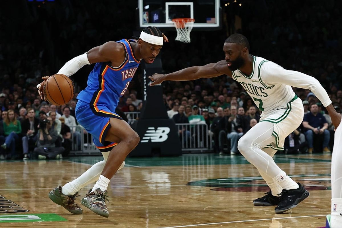Mar 25, 2026; Boston, Massachusetts, USA; Oklahoma City Thunder guard Shai Gilgeous-Alexander (2) looks to drive on Boston Celtics guard Jaylen Brown (7) during the second quarter at TD Garden. Mandatory Credit: Winslow Townson-Imagn Images
