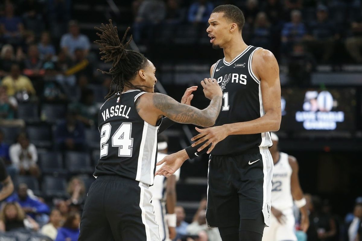 Mar 25, 2026; Memphis, Tennessee, USA; San Antonio Spurs forward Victor Wembanyama (1) and guard Devin Vassell (24) react during the third quarter against the Memphis Grizzlies at FedExForum. Mandatory Credit: Petre Thomas-Imagn Images