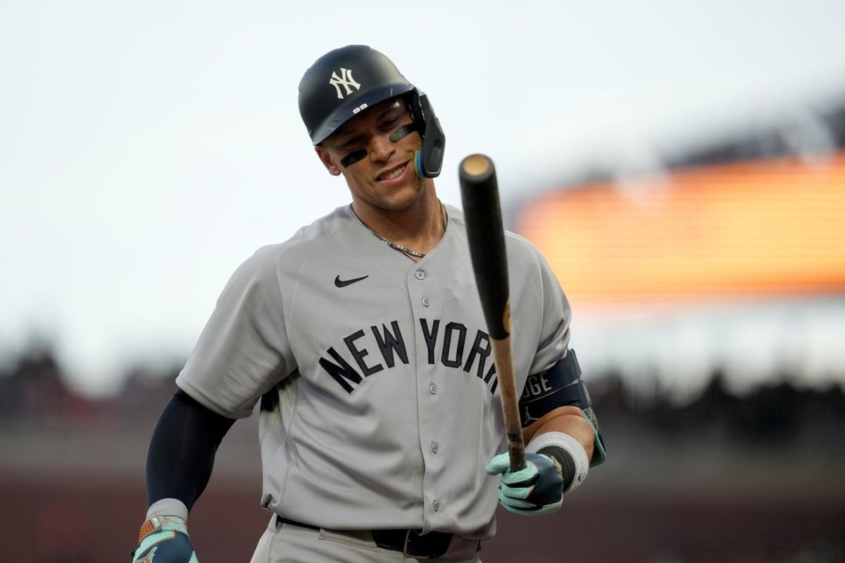 Mar 25, 2026; San Francisco, California, USA; New York Yankees right fielder Aaron Judge (99) looks at his bat between pitches against the San Francisco Giants in the sixth inning at Oracle Park. Mandatory Credit: Cary Edmondson-Imagn Images