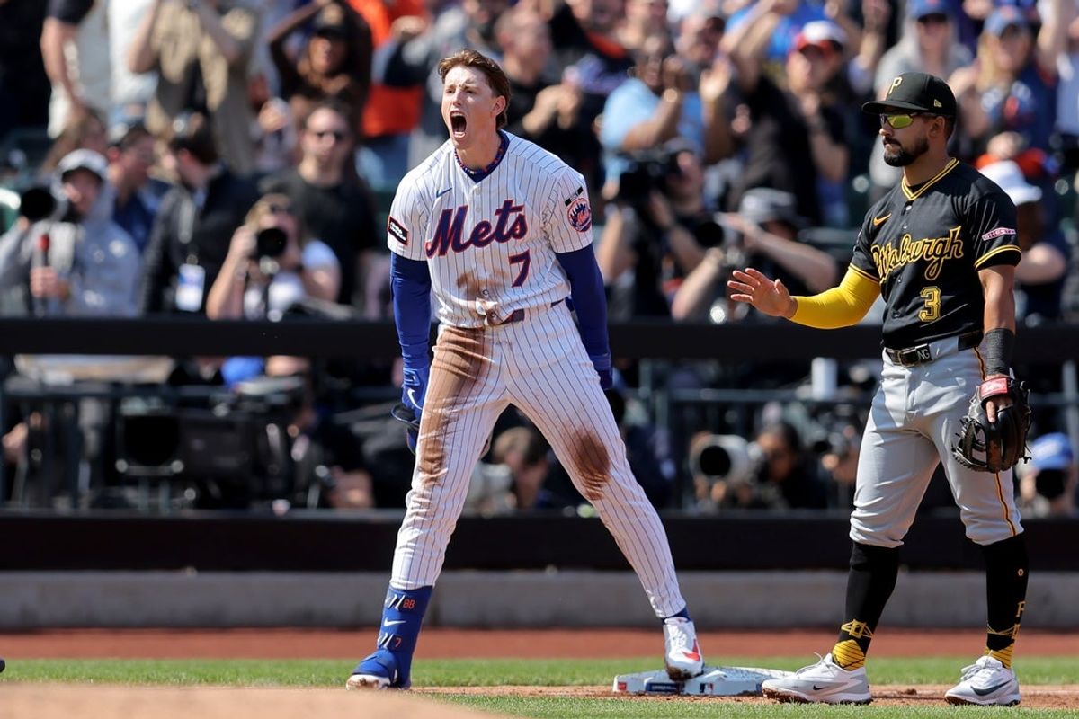 Mar 26, 2026; New York City, New York, USA; New York Mets designated hitter Brett Baty (7) reacts after hitting an RBI triple against the Pittsburgh Pirates during the first inning at Citi Field. Mandatory Credit: Brad Penner-Imagn Images